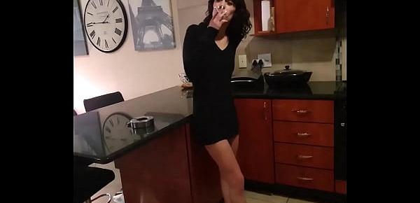  Skinny brunette pissing in her white panties while smoking a cigarette